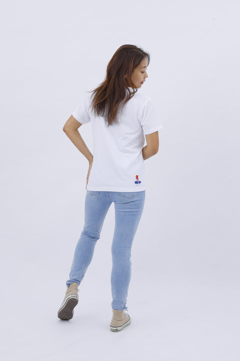 Back view of the "Surfing" T-shirt worn by the model, showing the rear print and silhouette.