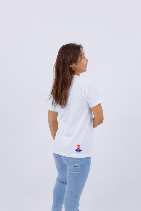 Side view of the "Surfing" T-shirt worn by a woman, showcasing the back print and sleeve design.