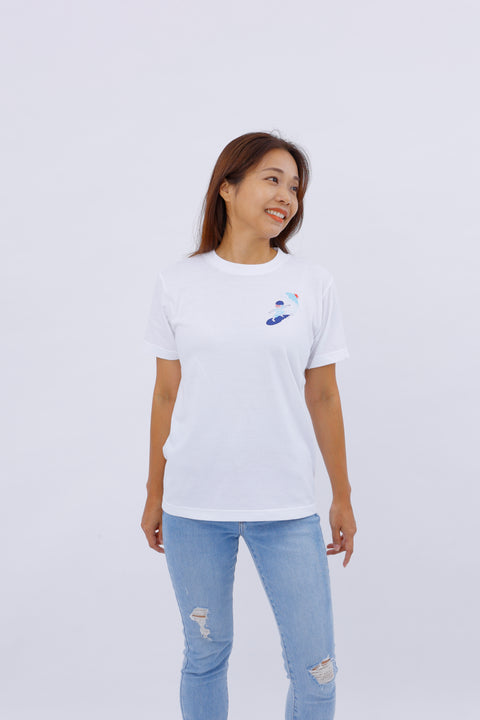 Woman standing straight wearing the "Surfing" T-shirt, front-facing with arms relaxed.