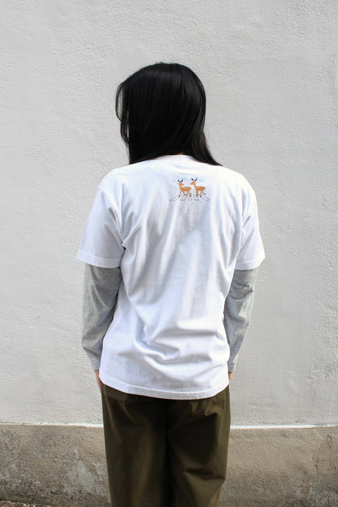 Back view of a gray long-sleeved T-shirt layered under a white “Deer Walk” T-shirt