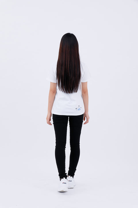 Back view of adult wearing white T-shirt "Kumitaiso" and black pants