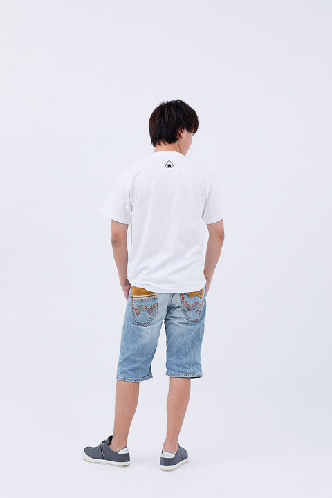 Rear view of the man wearing the "Onigiri" T-shirt and jeans, standing straight.