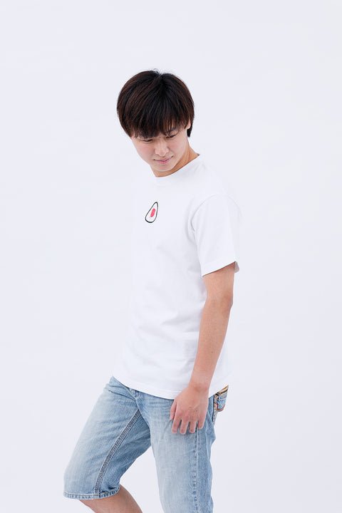 Side view of the man in the "Onigiri" T-shirt and jeans, looking slightly downward.