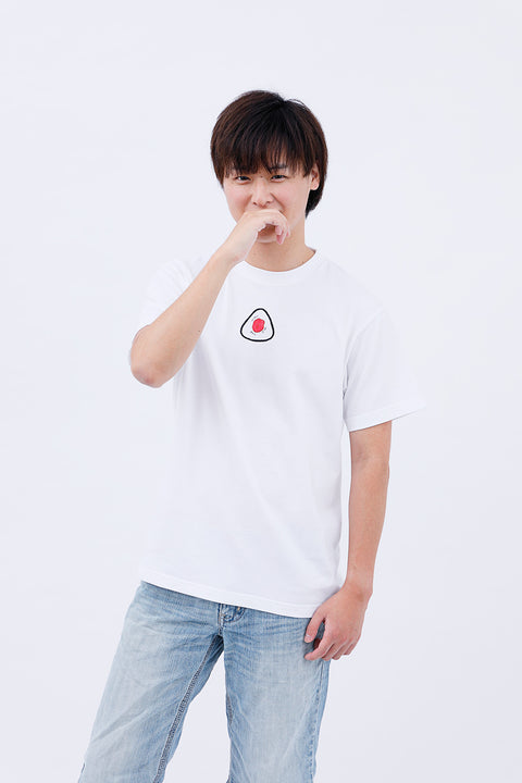 Front view of a man wearing the white "Onigiri" T-shirt and light blue jeans, touching his face while looking at the camera.