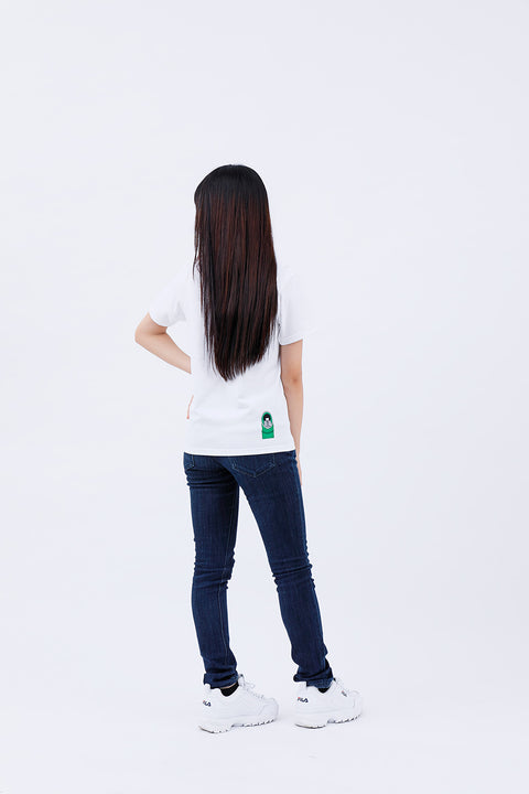 Full-body rear angled view of the woman wearing the "Kaguyahime" T-shirt and jeans, standing straight.