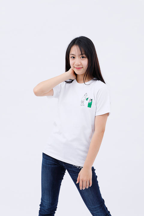 Front view of a smiling woman wearing the white "Kaguyahime" T-shirt and dark blue jeans, posing with one hand near her neck.