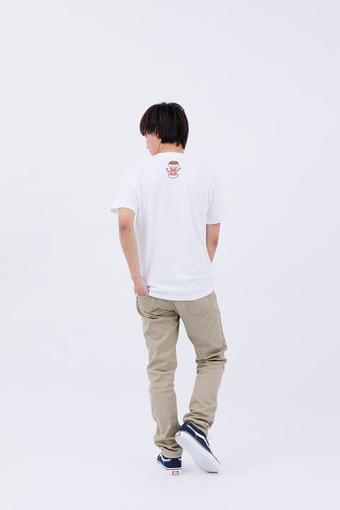 Full-body rear angled view of the man wearing the "Takoyaki" T-shirt and beige pants, walking casually.