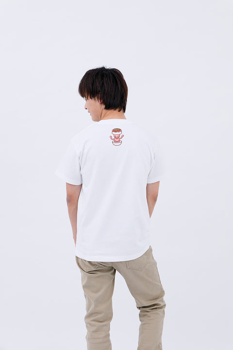 Rear view of the man wearing the "Takoyaki" T-shirt and beige pants, showing the back print.