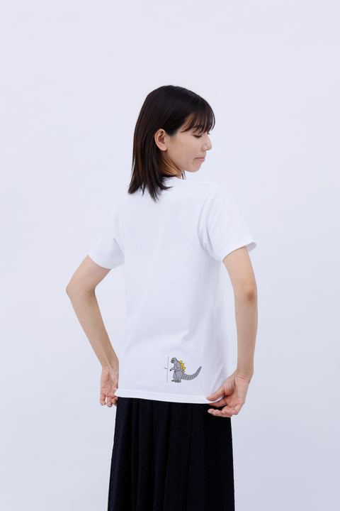 Side view of the woman wearing the "Five-story Pagoda & Kaiju Monster" T-shirt, showing the placement of the design on the lower front.