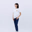 Full-body front view of the woman in the "Ramen" T-shirt and blue jeans, standing casually.